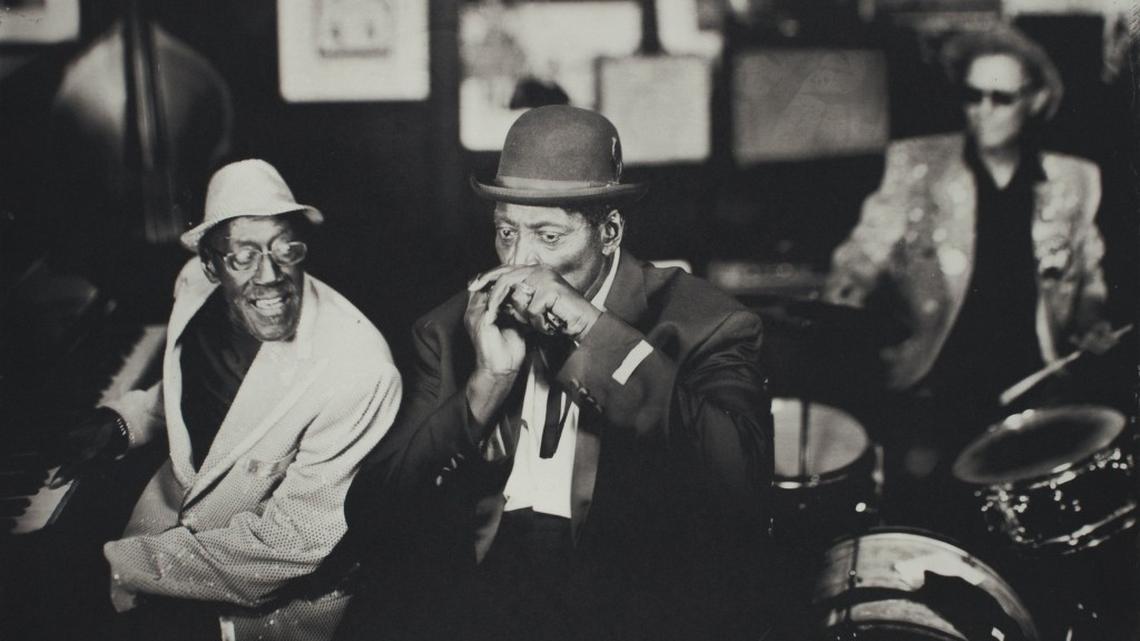 
"Ardie Dean, Sam Frazier Jr., Ironing Board Sam, Deep Blues Musicians, Hillsboro, NC, 2015," is part of the "Our Living Past" exhibit by by Timothy Duffy at the Gregg Museum of Art & Design in Raleigh. Duffy’s wet plate collodion prints bring attention to the traditional musicians of the South.
