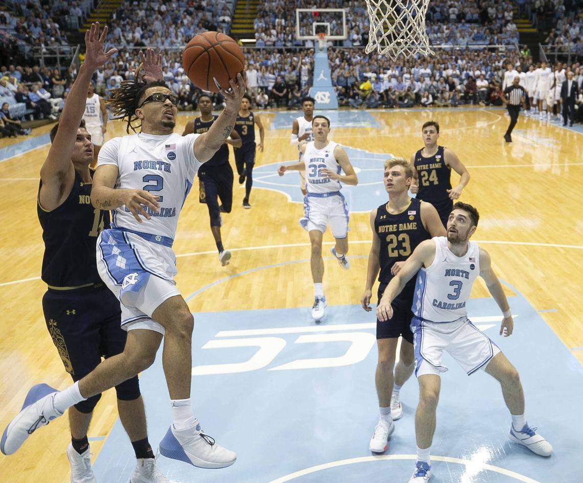 North Carolina’s Cole Anthony (2) drives to the basket against Notre Dame’s Nate Laszewski (14) during the first half on Wednesday November 6, 2019 at the Smith Center in Chapel Hill, N.C. Anthony lead all scores with 34 points in the Tar Heels’ 76-65 victory.