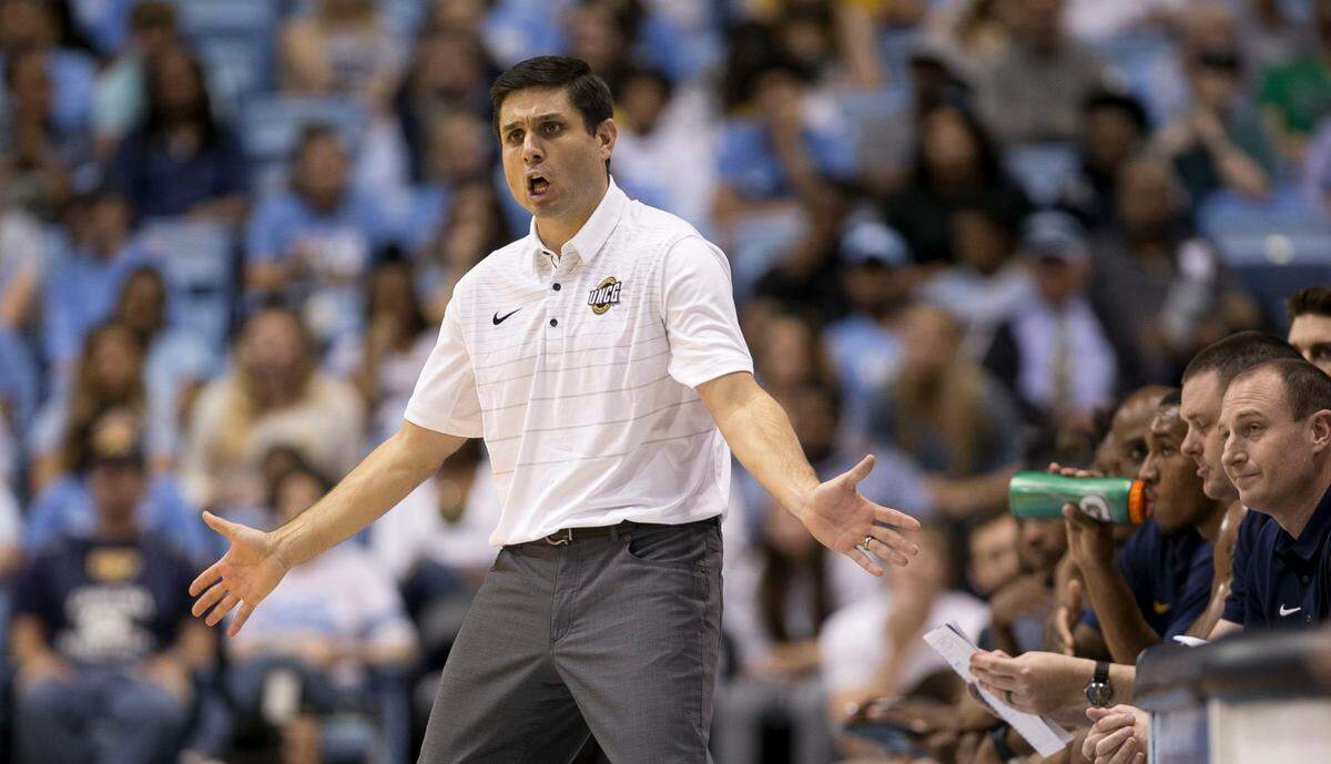 UNC Greensboro head coach Wes Miller directs his team during a scrimmage against North Carolina at the North Carolina Disaster Relief Jamboree on Sunday, November 5, 2017 at the Smith Center in Chapel Hill, N.C. 