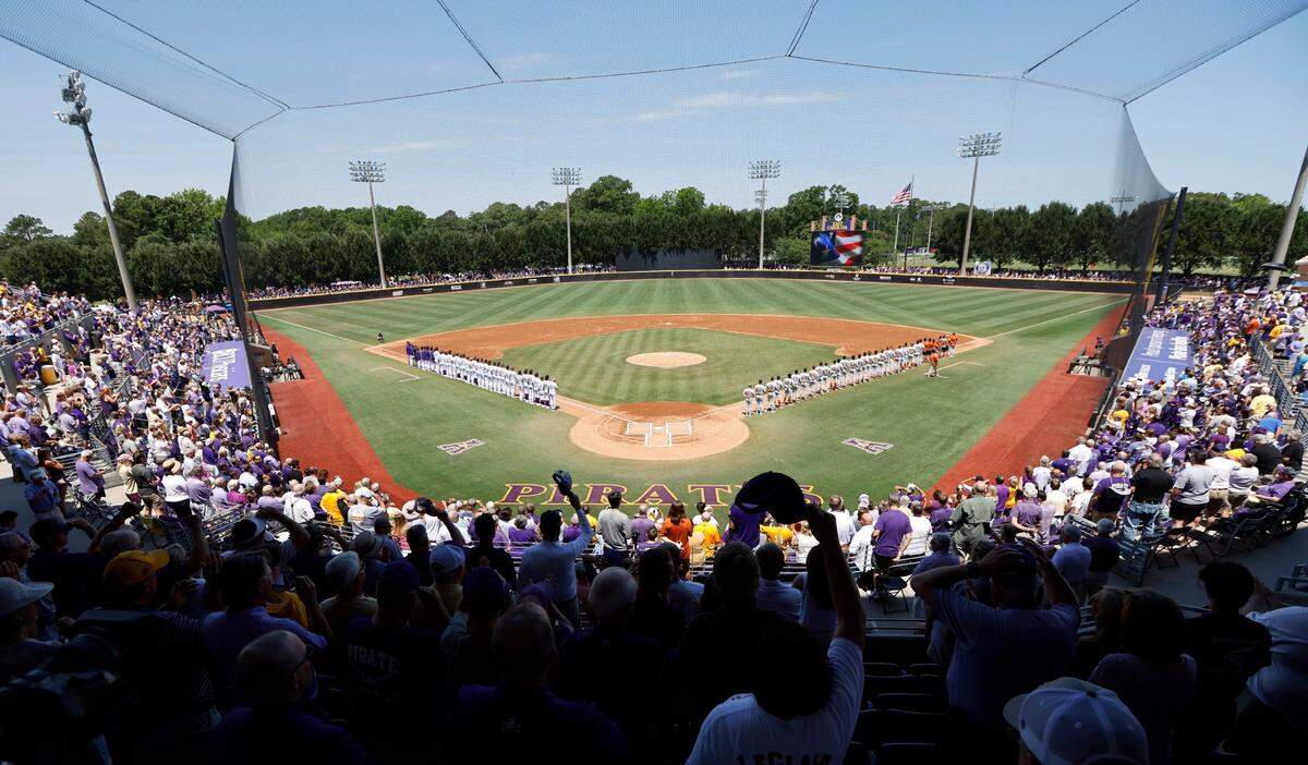 East Carolina and Texas line up for the national anthem before ECUs game against Texas in the Greenville Super Regional at Clark-LeClair Stadium Friday, June 10, 2022.