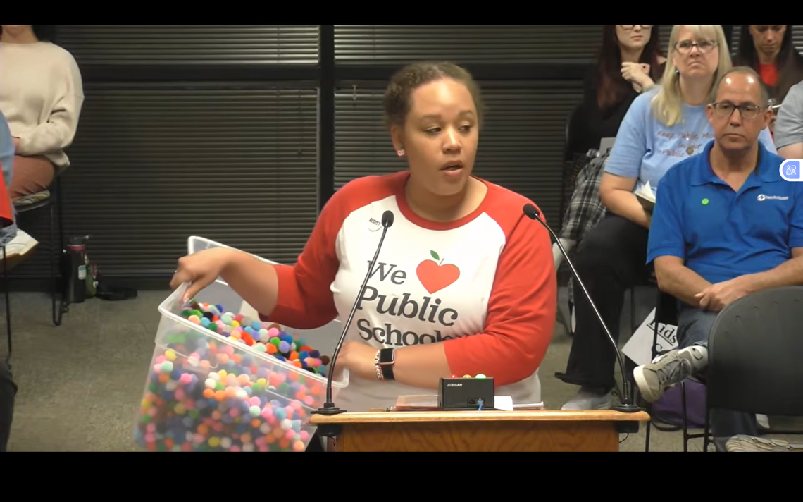 Wake NCAE President Christina Cole asks that May 1 be a teacher workday for all schools at the Wake County school board meeting on April 21, 2026, in Cary, N.C.