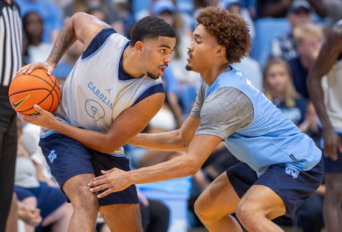 North Carolina’s Elijah Davis (6) faces off against Seth Trimble (7) in the first half during the Tar Heels’ Blue vs. White scrimmage on Saturday, October 12, 2024 at the Smith Center in Chapel Hill, N.C.