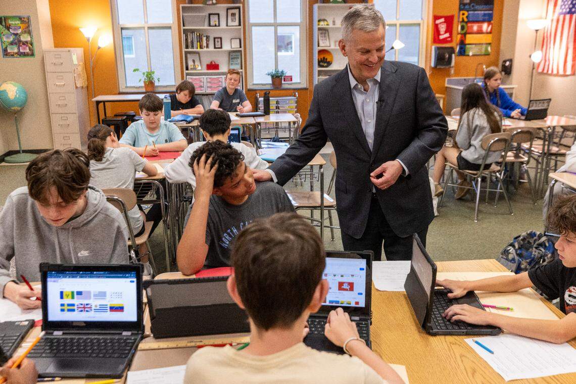 Gov. Josh Stein speaks with students at Moore Square Magnet Middle School during a tour of the school on Monday, April 7, 2025. Stein announced the creation of a new school safety and wellness advisory council.