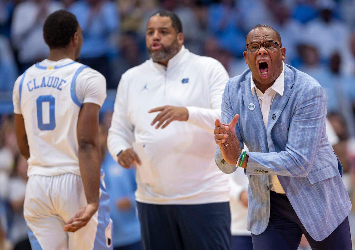 North Carolina coach Hubert Davis encourages his players on defense in the first half against Alabama on Wednesday, December 4, 2024 at the Smith Center in Chapel Hill, N.C.