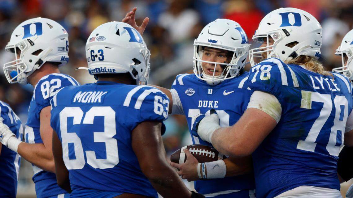 Duke Blue Devils quarterback Riley Leonard, center, celebrates with teammates following a Blue Devils touchdown during the first half of Dukes game against North Carolina A&T at Wallace Wade Stadium in Durham, N.C. on Saturday, Sept. 17, 2022.