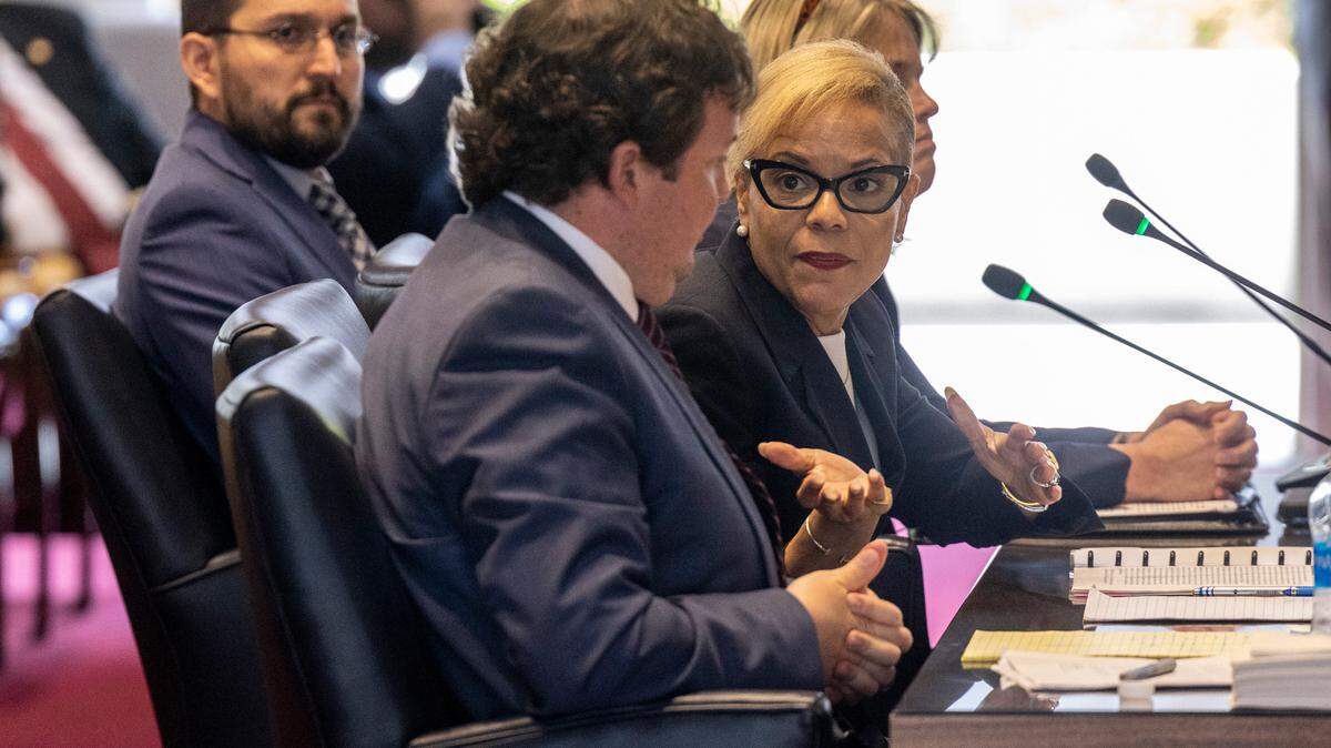 Gov. Roy Cooper’s Chief of Staff Kristi Jones, right, and General Counsel Eric Fletcher, center, testify before the House Oversight and Reform Committee on May 2, 2023 at the State Legislative Building.