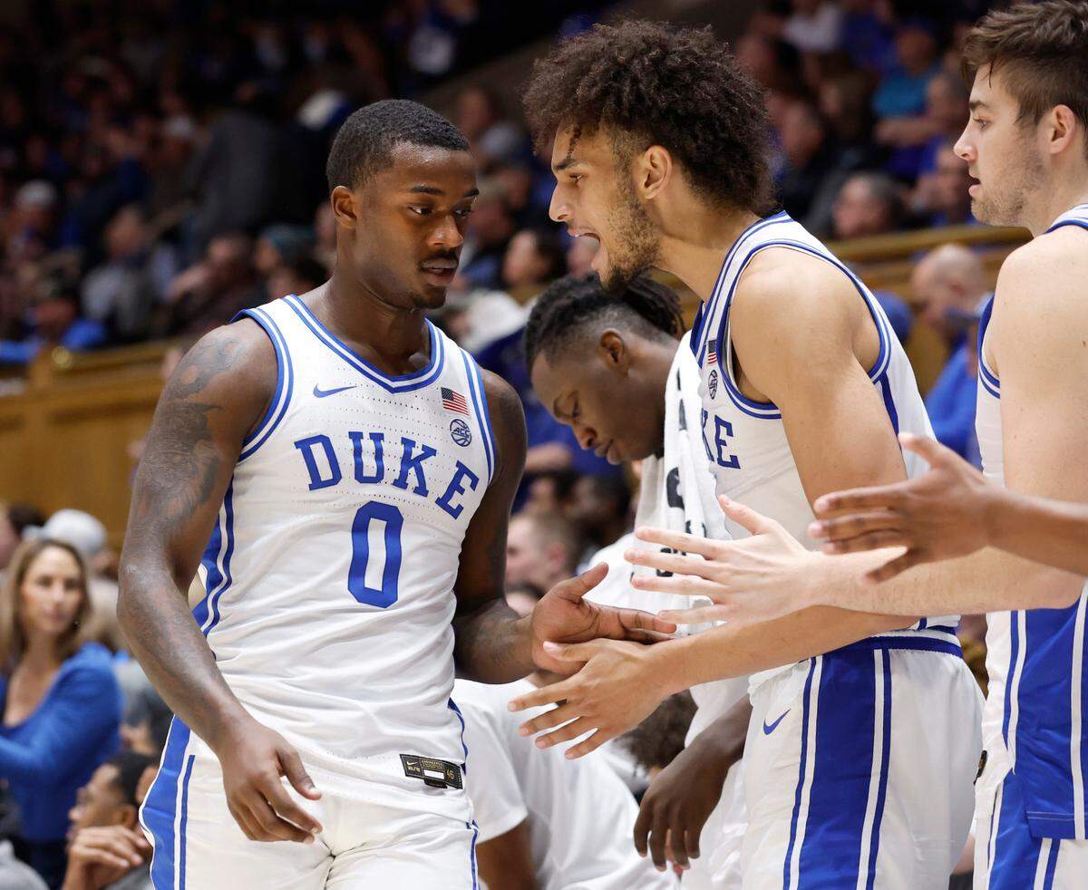 Duke’s Dereck Lively II (1) congratulates Dariq Whitehead (0) as he comes off the court during the second half of Duke’s 82-55 victory over Maryland-Eastern Shore at Cameron Indoor Stadium in Durham, N.C., Saturday, Dec. 10, 2022.
