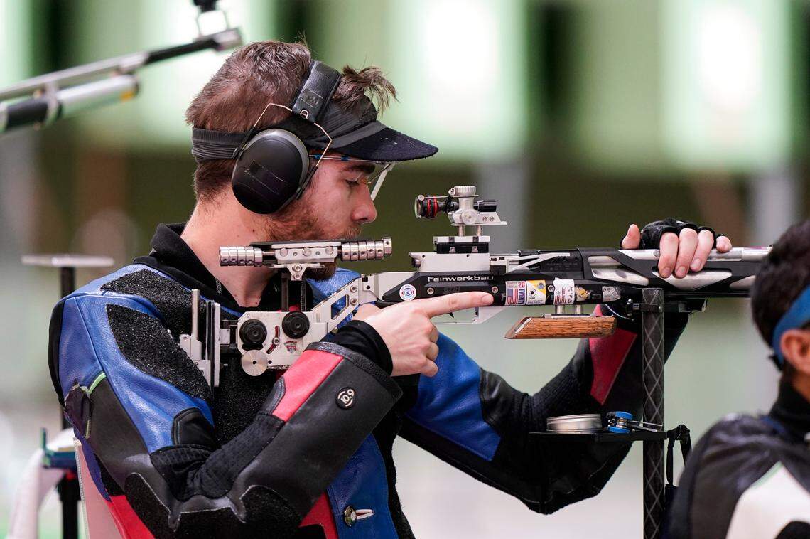 Lucas Kozeniesky competes in the men’s 10-meter air rifle at the Asaka Shooting Range in the 2020 Summer Olympics, Sunday, July 25, 2021, in Tokyo, Japan. He won a silver medal.