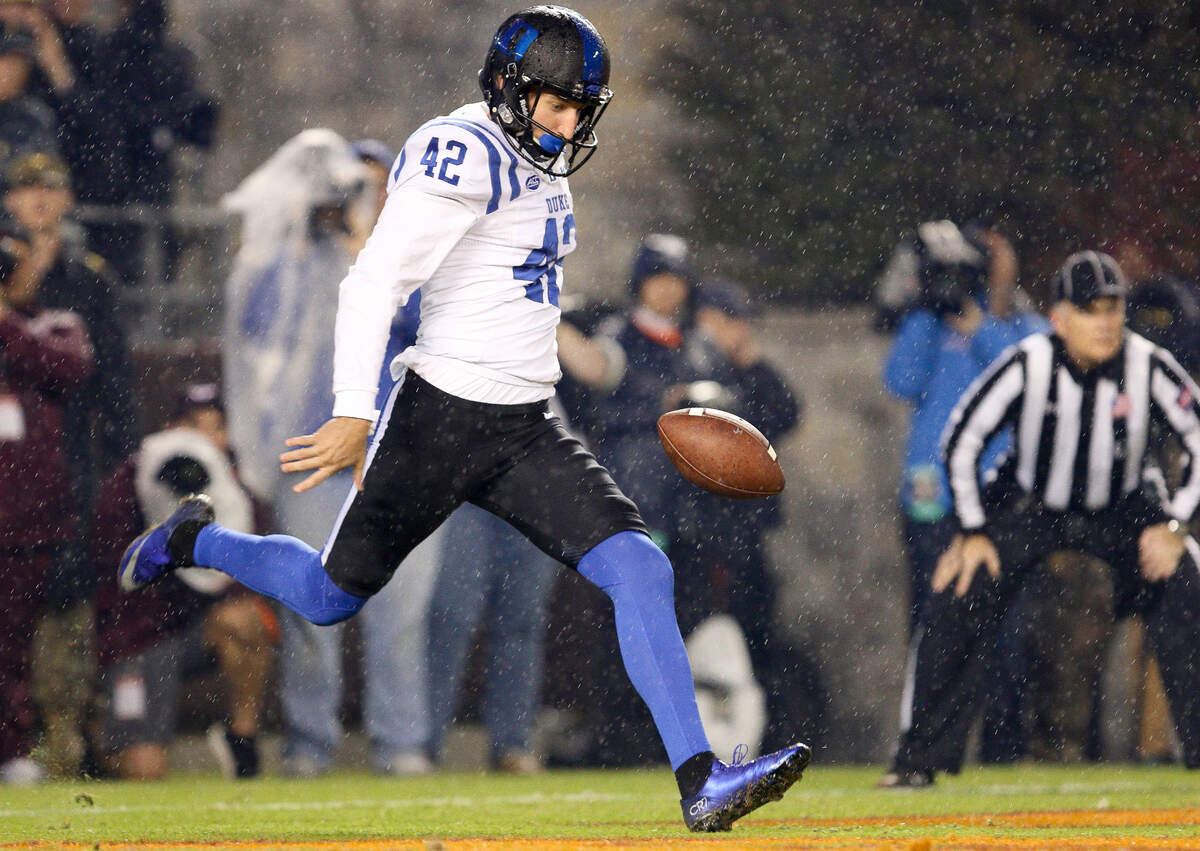 Duke’s Austin Parker punts the ball during a football game against Virginia Tech on Oct. 28, 2017, at Lane Stadium in Blacksburg, Va.
