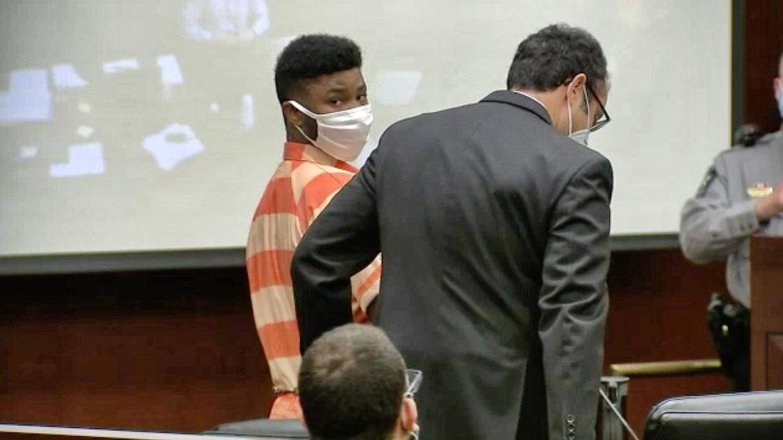 Stephen Joseph Bynem, 30, turns to look out at the mother of slain UPS driver Dylan Wall in a Wake County courtroom Thursday, Feb. 11, 2021. Bynem is charged with the murder of Wall and was making his first appearance.
