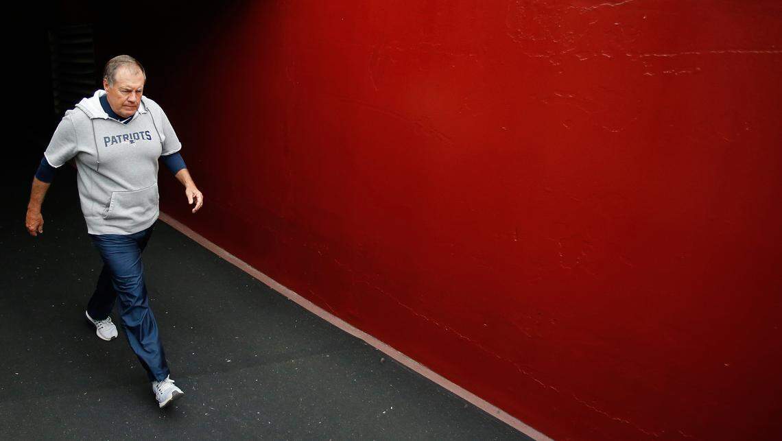 New England Patriots head coach Bill Belichick walks out of the tunnel onto the field prior to the Patriots’ game against the Washington Redskins at FedExField in 2019.