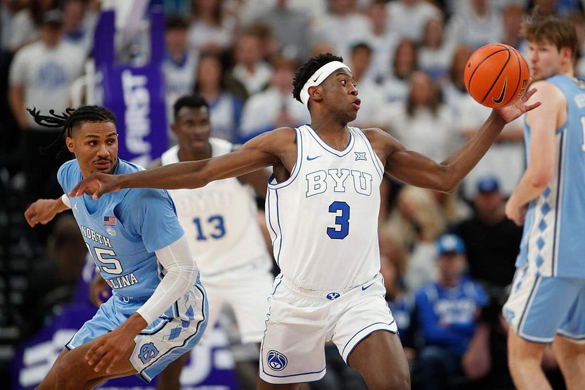 AJ Dybantsa (3) of BYU steals the ball from Jarin Stevenson (15) of the North Carolina Tar Heels during the first half of their exhibition game at the Delta Center on October 24, 2025 in Salt Lake City, Utah.