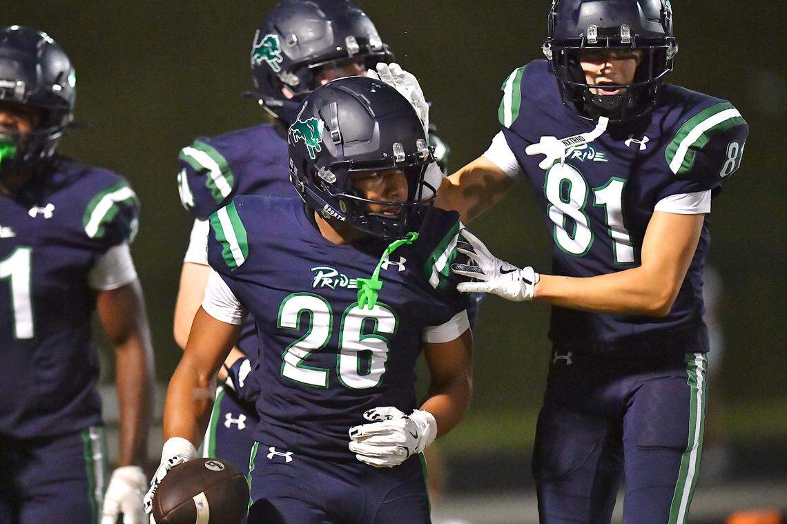 Leesville Road running back Michael Ramsey (26) celebrates his touchdown against Heritage with Dean Henshall (81) during the second half. The Leesville Road Pride and the Heritage Huskies met in a football game in Raleigh, N.C. on September 5, 2025.