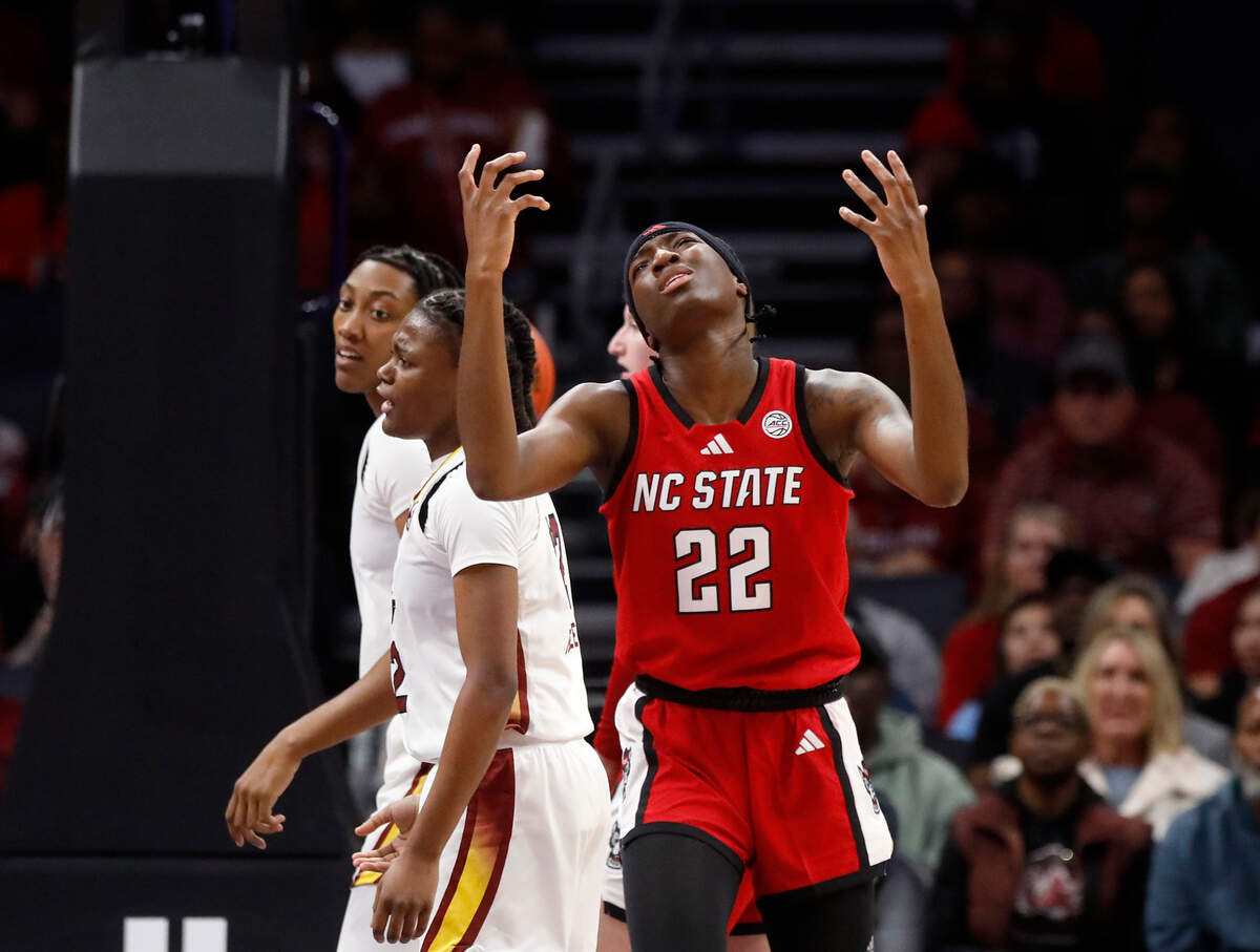 N.C. State’s Saniya Rivers reacts after being charged with a foul during the first half of the Wolfpack’s 71-57 loss to top-ranked South Carolina on Sunday, Nov. 10, 2024, at Spectrum Center in Charlotte, N.C.