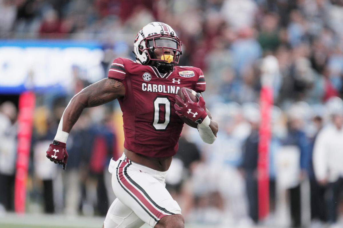 South Carolina Gamecocks tight end Jaheim Bell (0) score a touchdown against North Carolina at the Duke’s Mayo Bowl at Bank of America Stadium in Charlotte, North Carolina on Thursday, December 30, 2021.
