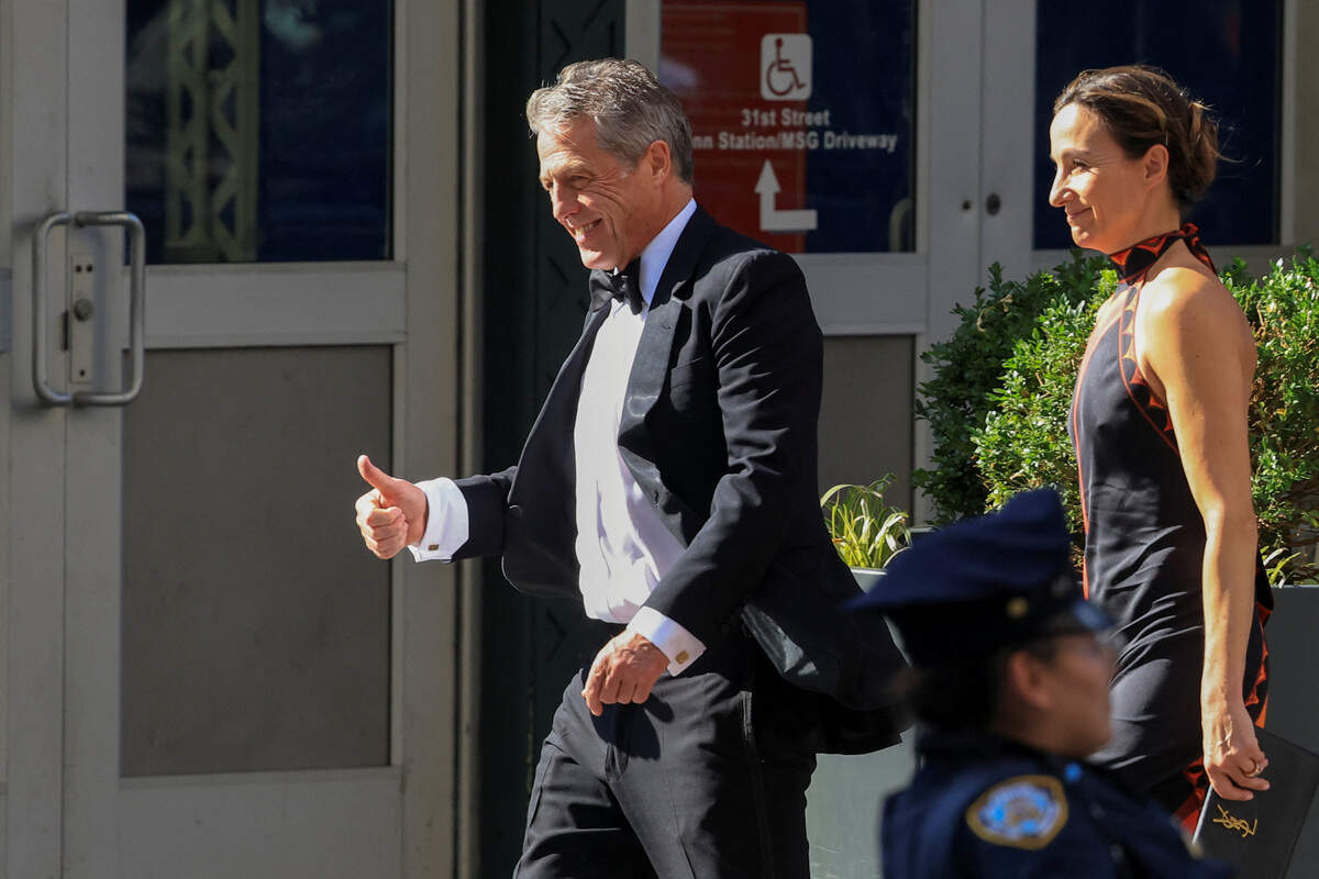 Actor Hugh Grant and Anna Elisabet Eberstein arrive at Madison Square Garden, the venue for the reported wedding celebrations of singer Taylor Swift and National Football League (NFL) player Travis Kelce, in New York, U.S., July 3, 2026.  REUTERS/Brendan McDermid