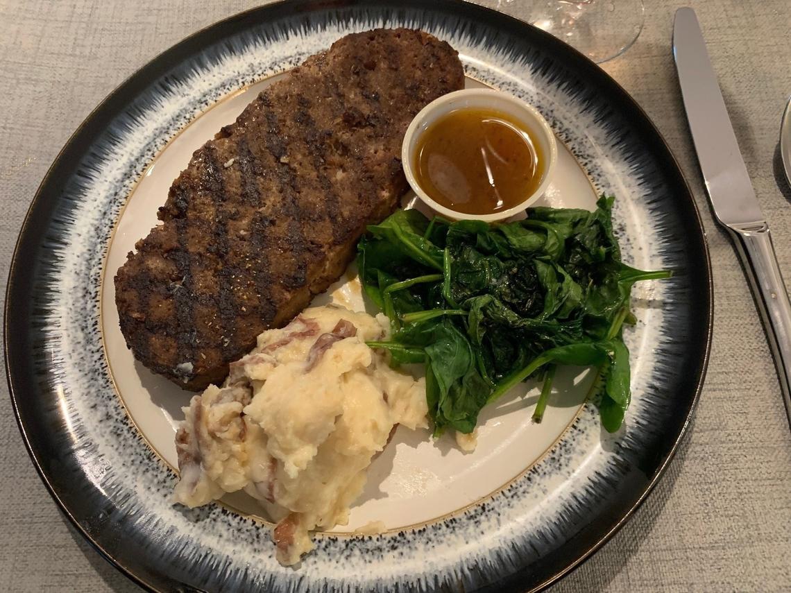 18 Cantina’s Curbside at Cameron Village features wood fire-grilled meatloaf, served with sautéed spinach and goat cheese mashed potatoes.