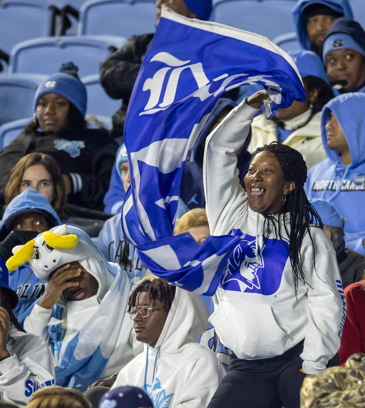 Duke fans celebrate, and Tar Heel fans bemoan, after taking a 29-26 lead over North Carolina in the fourth quarter on Saturday, Nov. 11, 2023 at Kenan Stadium in Chapel Hill, N.C.
