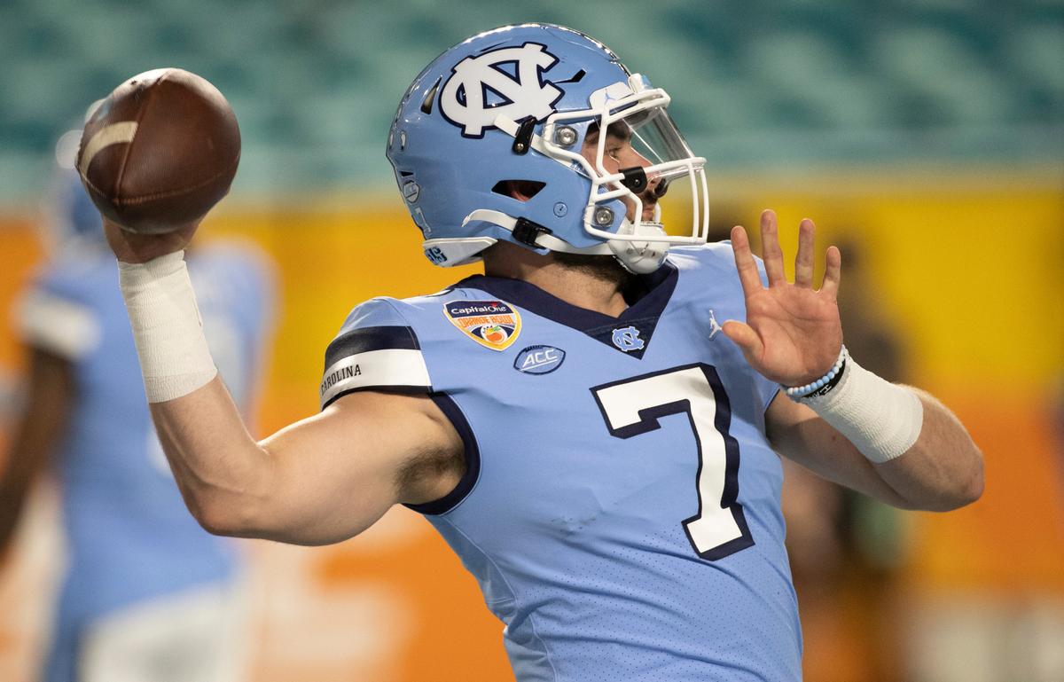 North Carolina quarterback Sam Howell (7) warms up for the Tar Heels’ game against Texas A&M in the Capital One Orange Bowl on Saturday, January 2, 2021in Miami Gardens, Florida.