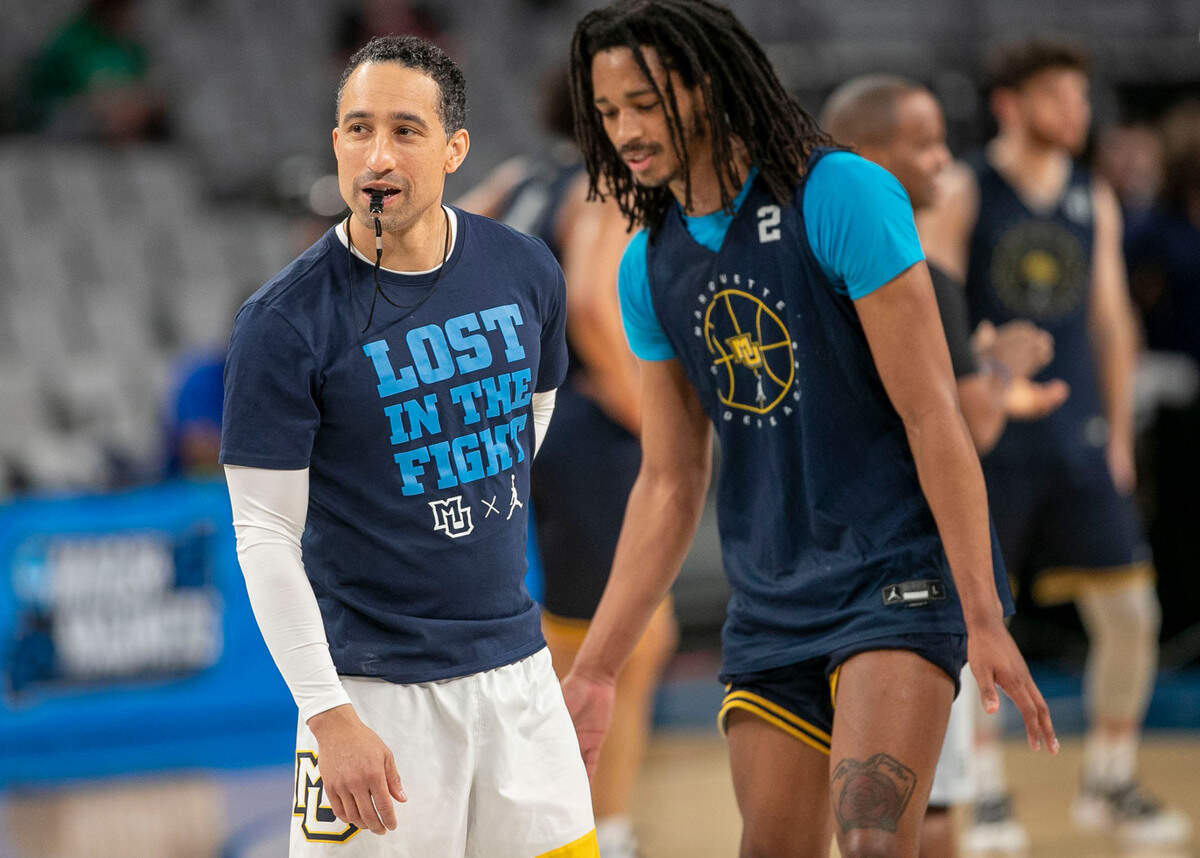 Marquette coach Shaka Smart watches his team during their practice on Wednesday, March 16, 2022 at Dickies Arena in Ft. Worth, TX, as they prepare for their opening round NCAA game against North Carolina.
