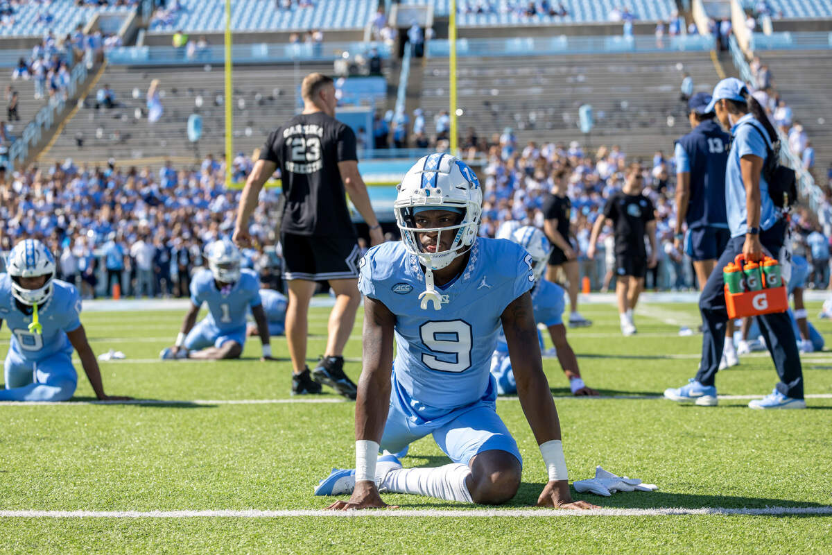 North Carolina wide receiver Devontez Walker (9) warms up with his teammates for the Tar Heels’ game against Syracuse on Saturday, October 7, 2023 at Kenan Stadium in Chapel Hill, N.C. Walker was granted eligibility this week by the NCAA to play in his first game of the 2023 season for the Tar Heels.