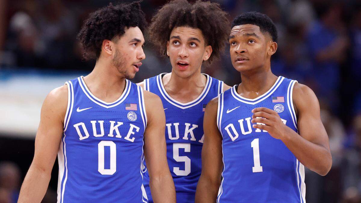 Duke’s Jared McCain (0), Tyrese Proctor (5) and Caleb Foster (1) talk after a timeout during the first half of Duke’s game against Michigan State in the Champions Classic at the United Center in Chicago, IL, Tuesday, Nov. 14, 2023.