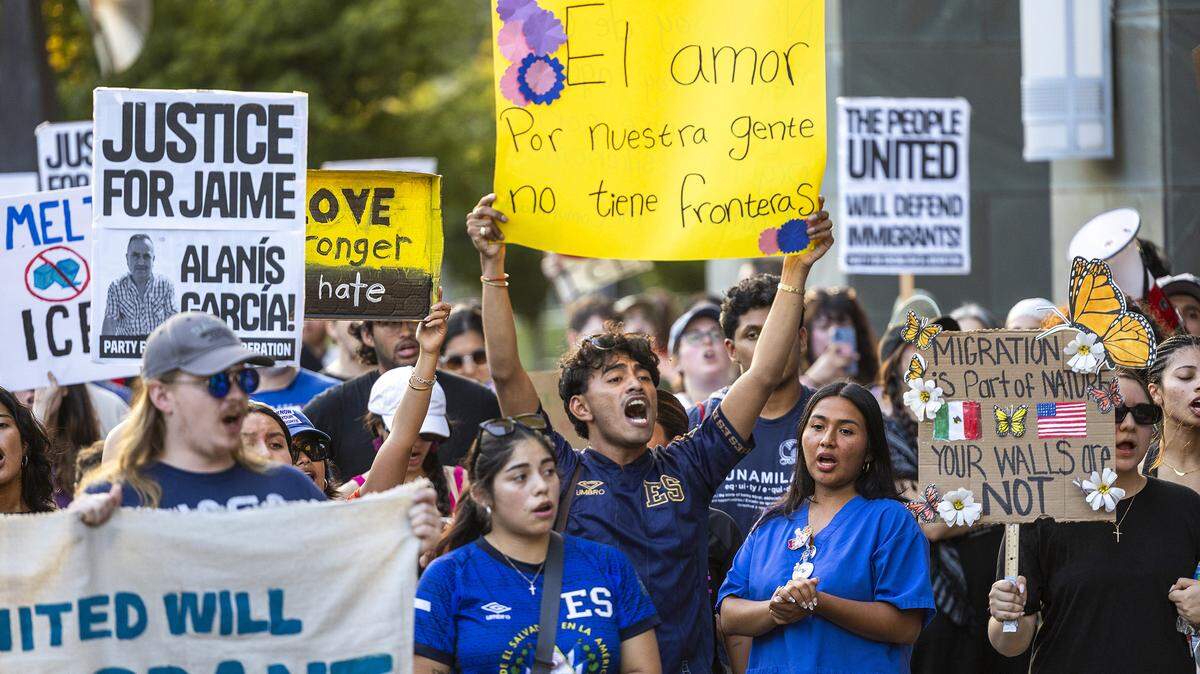 Demonstrators protest outside the Durham County Courthouse after marching through downtown Durham following a rally organized by the Party for Socialism and Liberation at CCB Plaza on Wednesday, July 23, 2025, demanding that ICE officers stay out of the city. An organizer with Siembra NC said federal Immigration and Customs Enforcement officers were at the courthouse to detain a man scheduled to appear in court that day. The unidentified man did not show up.