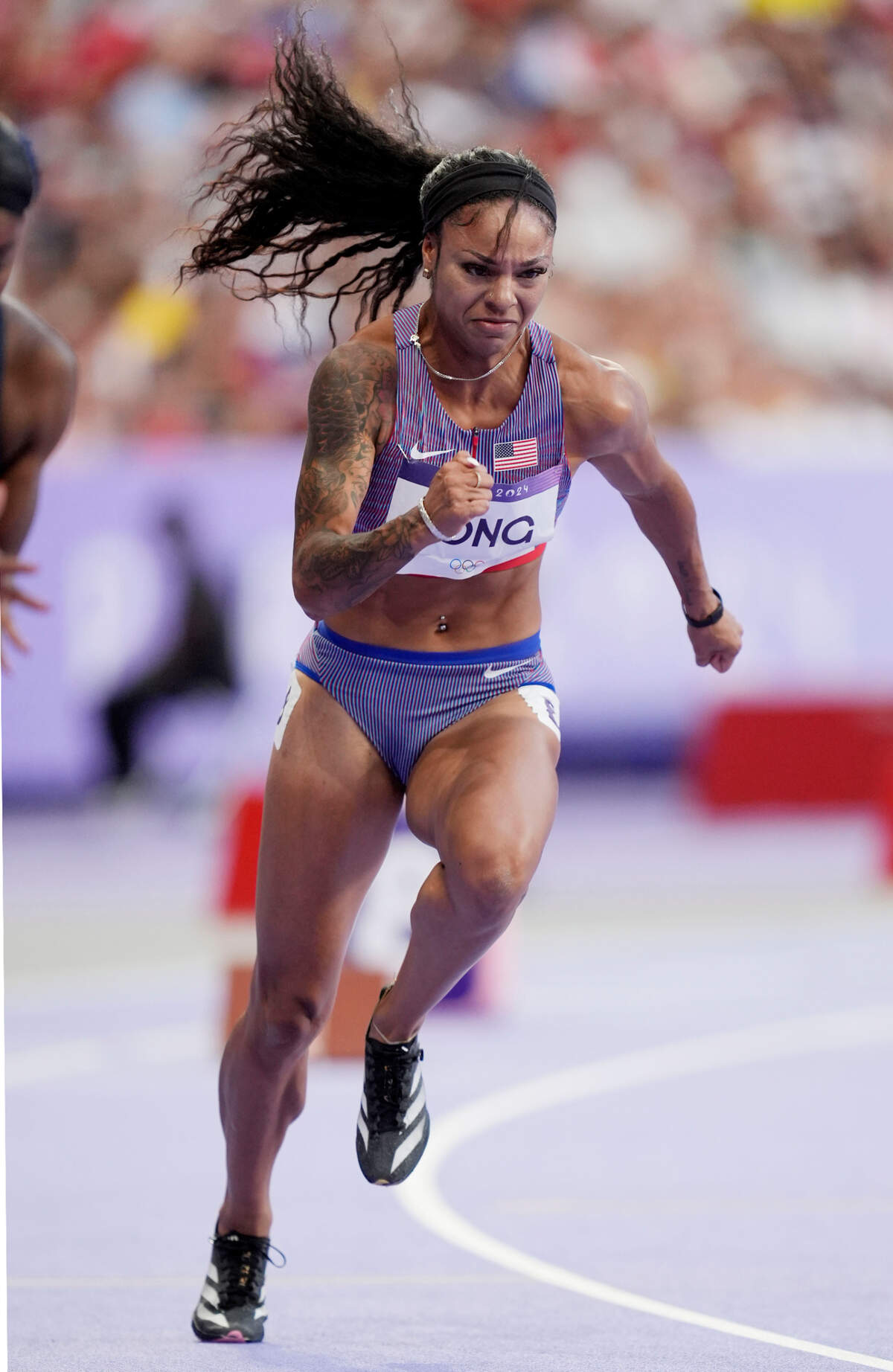 Aug 5, 2024; Paris Saint-Denis, France; McKenzie Long (USA) competes in a women’s 200m semifinal heat during the Paris 2024 Olympic Summer Games at Stade de France.