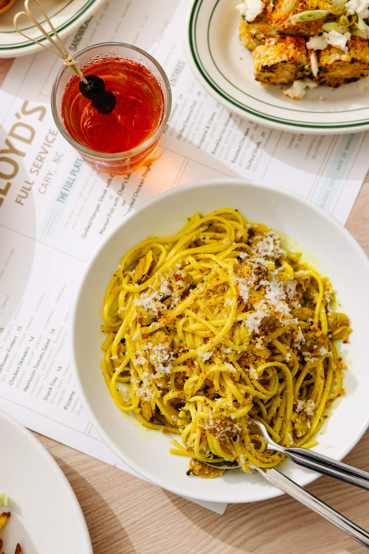 Among the signature dishes at the new Lloyd’s Full Service is a pasta plate of linguine with clams.