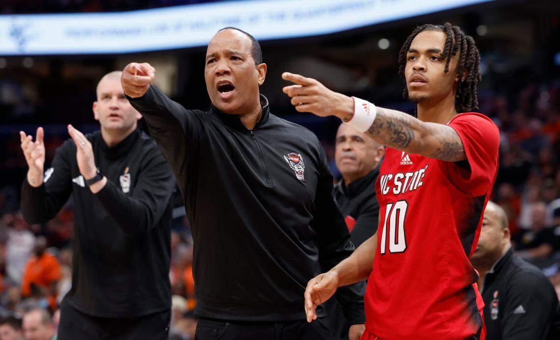 N.C. State’s head coach Kevin Keatts and Breon Pass (10) motionto the officials during the first half of N.C. State’s game against Syracuse in the second round of the 2024 ACC Men’s Basketball Tournament at Capital One Arena in Washington, D.C., Wednesday, March 13, 2024.