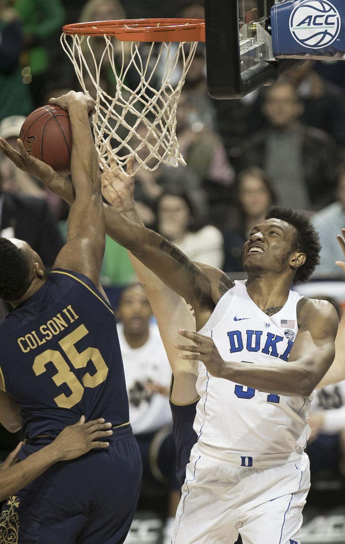 Notre Dame's Bonzie Colson (35) blocks a shot by Duke's Wendell Carter Jr. (34) during the first half.