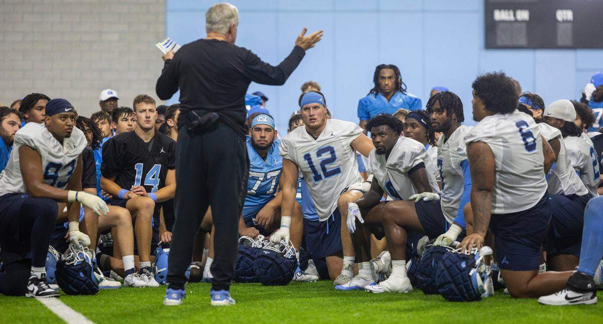 North Carolina coach Mack Brown addresses his players and staff following the Tar Heels’ first practice of the season on Monday, July 29, 2024 in Chapel Hill, N.C.