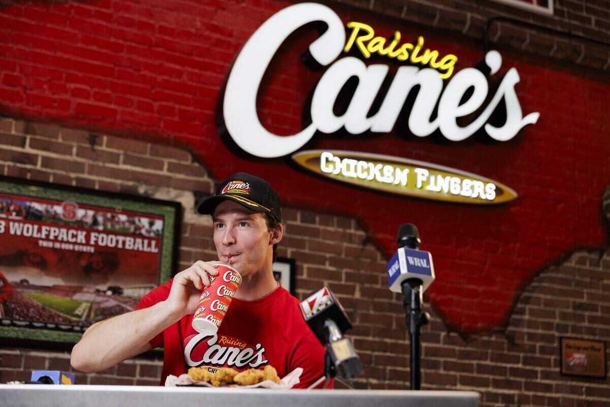 Andrei Svechnikov, winger for the Carolina Hurricanes, spoke in a press conference before he greeted and served Hurricanes fans at Raising Canes Chicken Fingers during the filming of marketing material for the restaurant on Tuesday, June 15, 2026. The Hurricanes won their second Stanley Cup— with their first being in 2006— on Sunday, June 14.