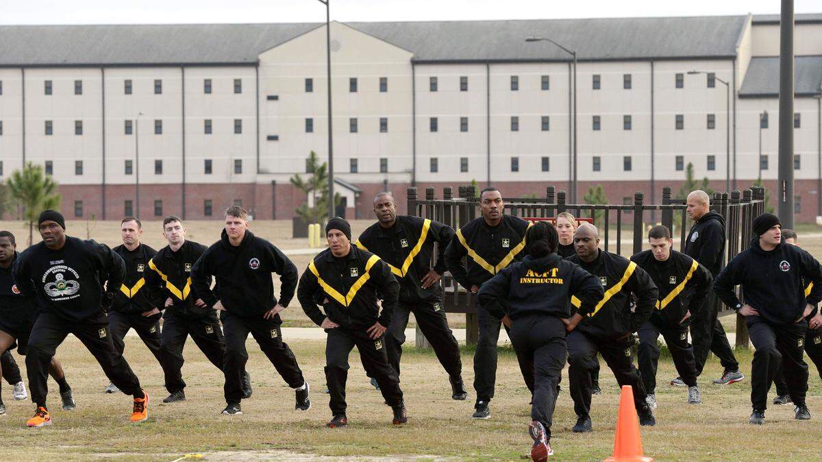 In this photo taken Tuesday, Jan. 8, 2019, U.S Army troops training to serve as instructors participate in the new Army combat fitness test at Fort Bragg, NC.