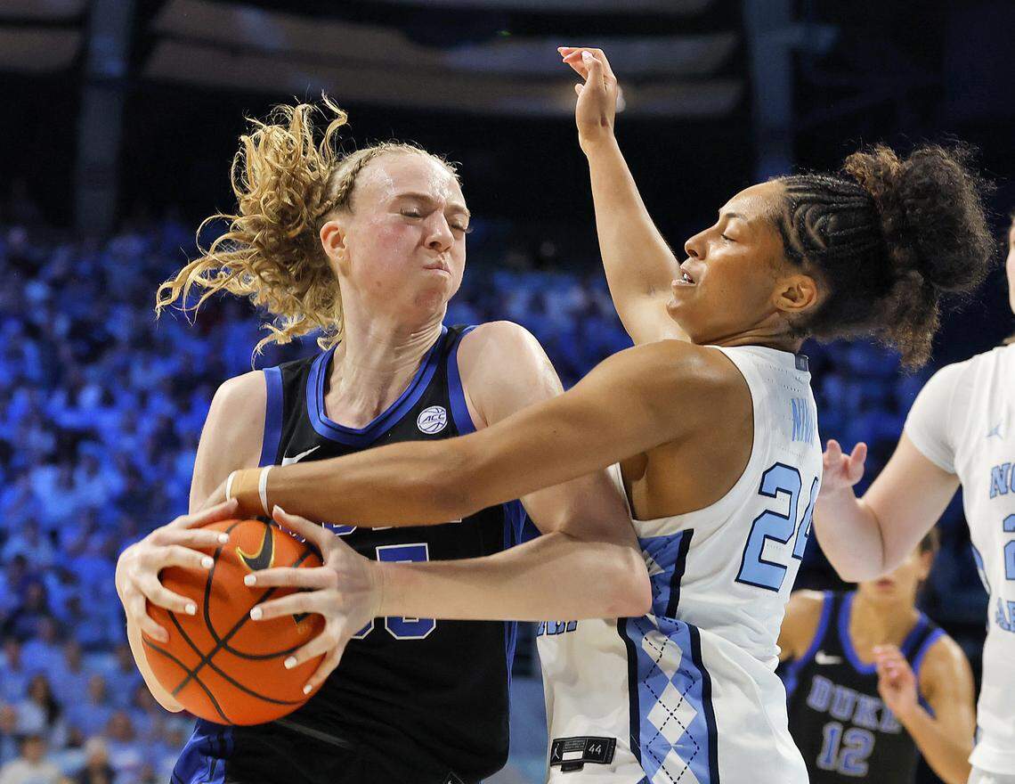 Duke’s Toby Fournier is fouled by North Carolina’s Indya Nivar during the second half of the Blue Devils’ 74-69 loss  on Sunday, March 1, 2026, at Carmichael Arena in Chapel Hill, N.C. 