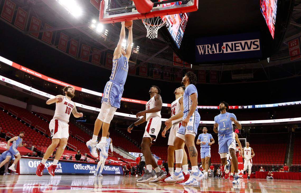 North Carolina’s Walker Kessler (13) heads to slam in two during N.C. State’s 79-76 victory over UNC at PNC Arena in Raleigh, N.C., Tuesday, December 22, 2020.