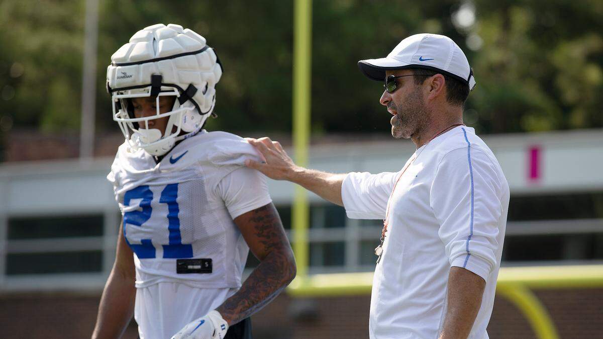 Duke head coach Manny Diaz speaks with Landan Callahan during practice on Wednesday, July 31, 2024, in Durham, N.C.