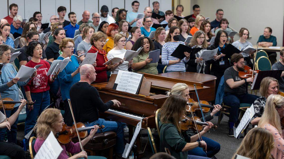 The Durham Symphony Orchestra, N.C. Central Kizazi Alumni Chorale and the Concert Singers of Cary rehearse Herman Whitfield III’s Overture-Fanfare in G Major at the Durham Arts Council on Tuesday, Feb. 4, 2025. Whitfield’s piece is part of Voices of the Unarmed: Justice, Love, Resilience, a free concert addressing police brutality against unarmed Black men.