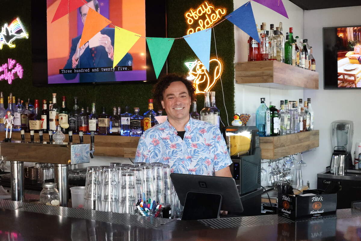 Libations 317 / Su-Z’s Asian Kitchen owner, Gregg Hamm, poses behind the counter of local downtown Raleigh bar