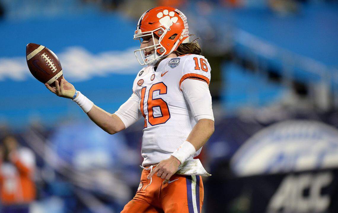 Clemson Tigers quarterback Trevor Lawrence rushes for a touchdown during third quarter action of the ACC Championship game. Clemson defeated Notre Dame 34-10 to win the championship at Bank of America Stadium in Charlotte, NC on Saturday, December 19, 2020.