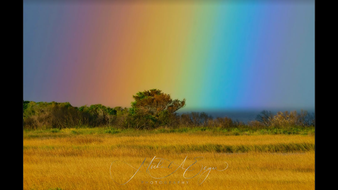 Michael A. Eager and his wife, Tracy, were running from rain when the turned and saw this rainbow on the Outer Banks.