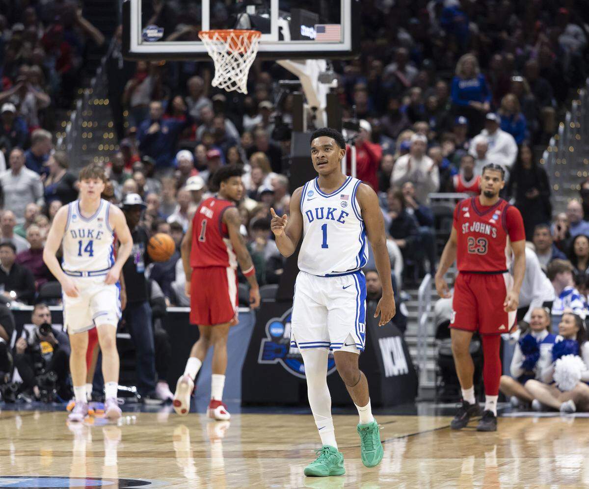 Duke guard Caleb Foster (1) reacts after scoring in the second half against St. John’s on Friday, March 27, 2026, during the Sweet Sixteen of the NCAA Tournament at Capital One Arena in Washington, D.C.