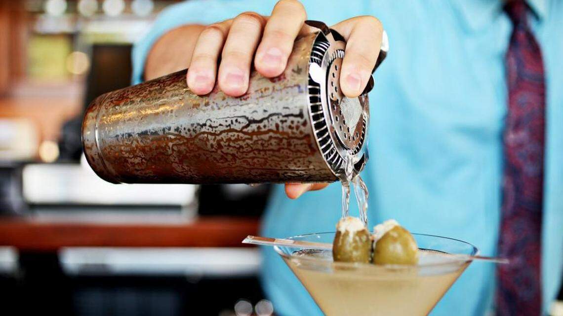 Co-owner Brad Weddington of NanaSteak in Durham makes a martini at the restaurant’s bar in 2016. Nana Steak is just a few steps from DPAC.