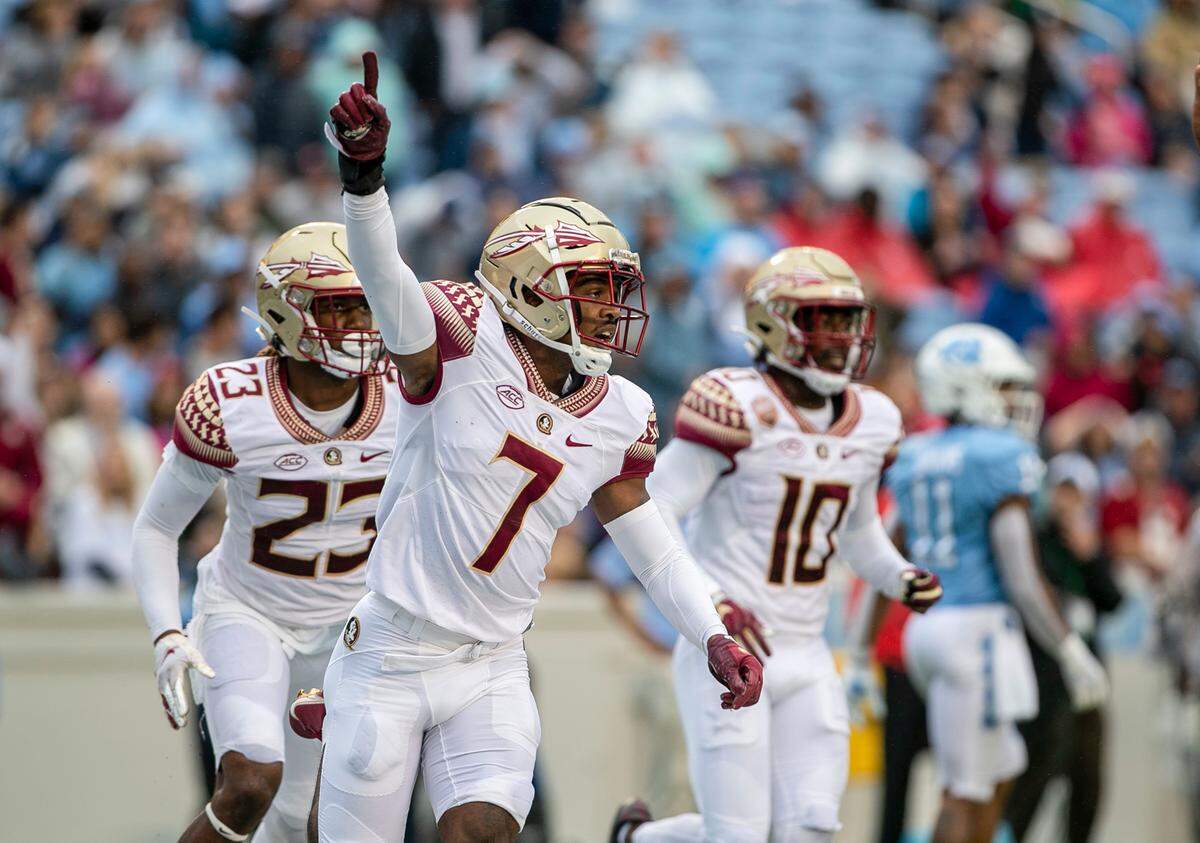 Florida State’s Jarrian Jones (7) reacts after intercepting a Sam Howell pass intended for Khafre Brown (1) in the second quarter on Saturday, October 9, 2021at Kenan Stadium in Chapel Hill, N.C.
