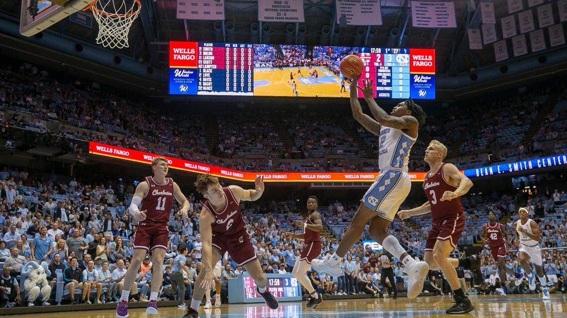 North Carolina’s Caleb Love (2) puts up a shot against College of Charleston’s Reyne Smith (2) during the first half on Friday, November 11, 2022 at the Smith Center in Chapel Hill, N.C. Love scored 25 points in the Tar Heels’ victory.