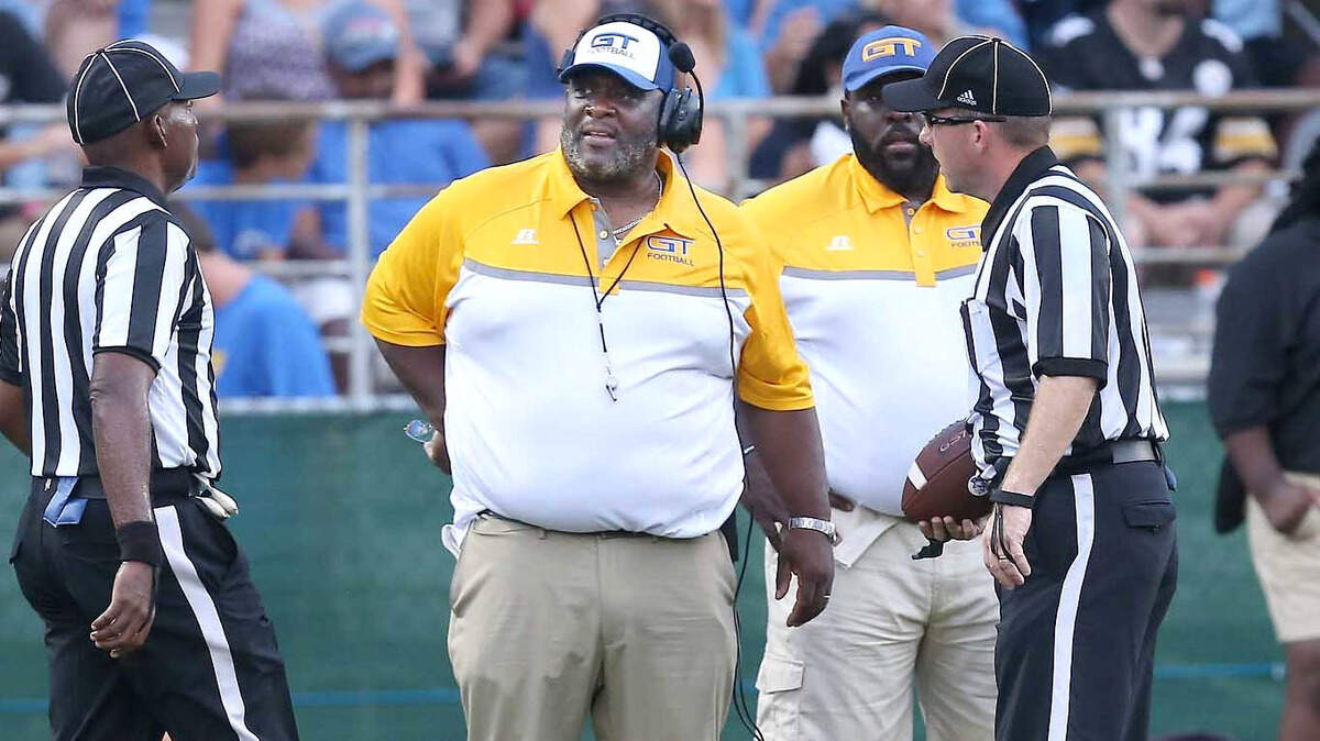 Garner coach Thurman Leach talks to the referees during a game against Cary High School in 2016.