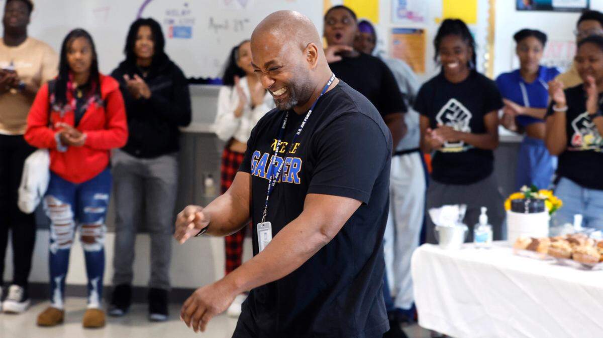 Terry Hennings, a Civic Literacy and African American Studies teacher at Garner High School, laughs during a celebration for Hennings at the school Friday, April 28, 2023. Hennings was named the 2023 Wake County Teacher of the Year at a ceremony Thursday night at the Raleigh Convention Center. “There are so many outstanding teachers in Wake County and for me to selected as teacher of the year is beyond my wildest dreams” said Hennings at the celebration.