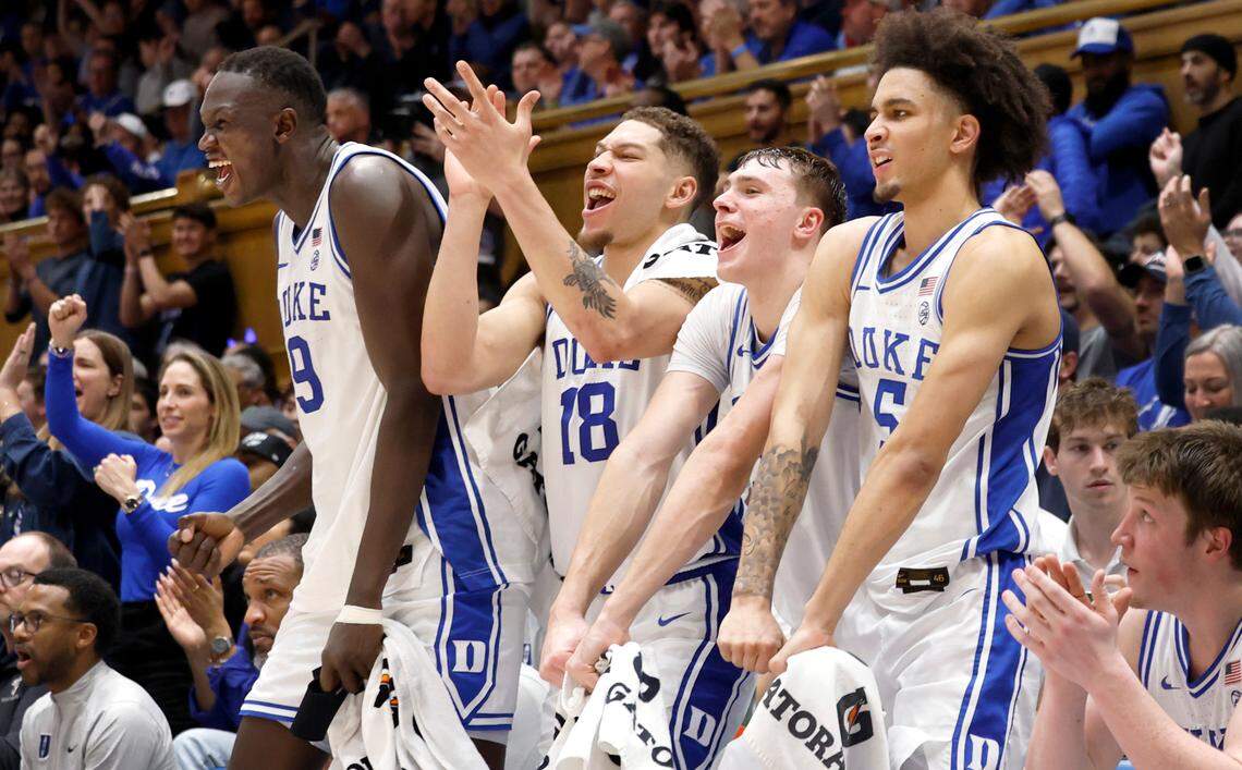 From left, Duke’s Khaman Maluach (9), Mason Gillis (18), Cooper Flagg (2) and Tyrese Proctor (5) celebrate after Patrick Ngongba II drove in for two in the second half of Duke’s 78-57 victory over Cal at Cameron Indoor Stadium in Durham, N.C., Wednesday, Feb. 12, 2025.
