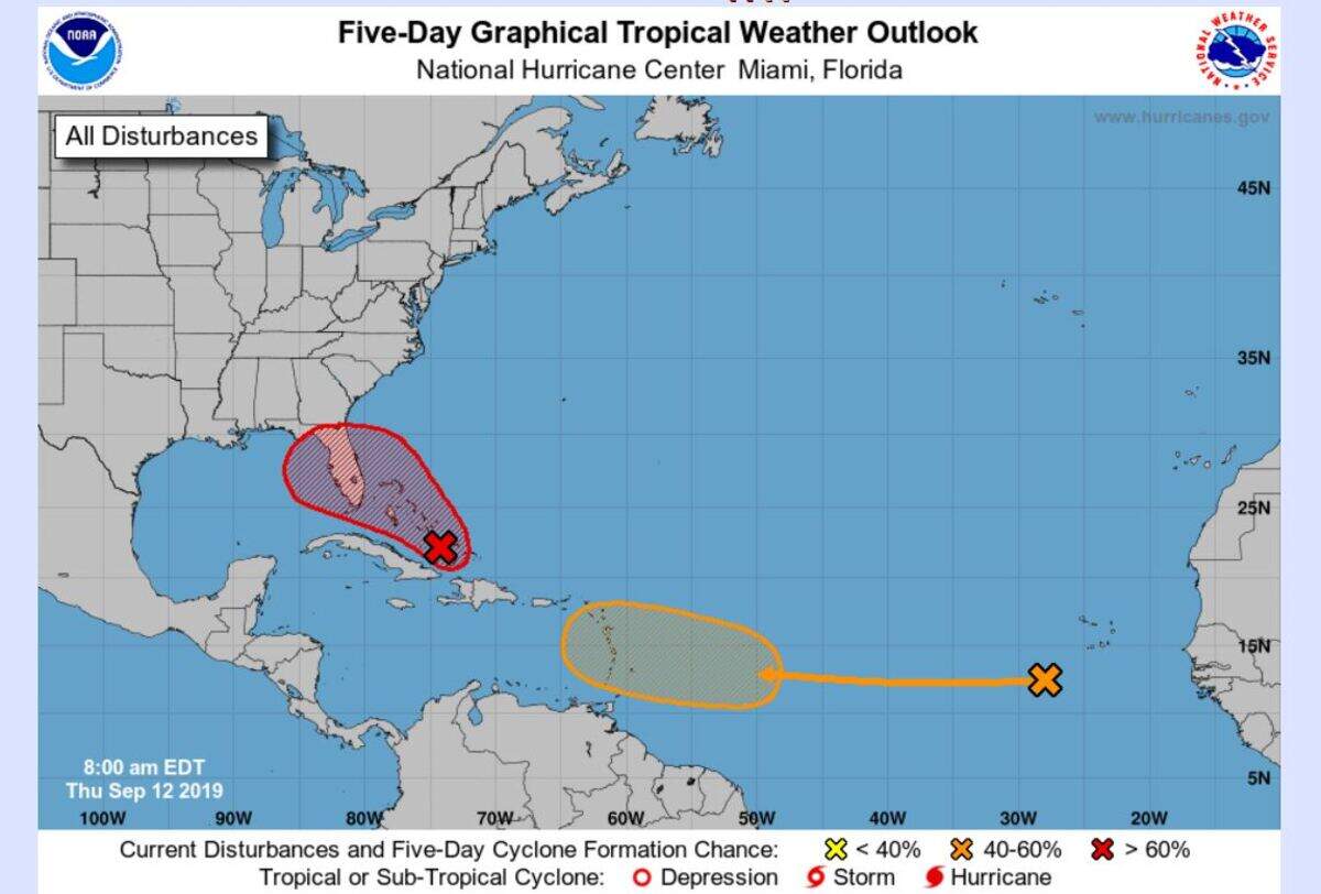 The National Hurricane Center says a system moving into the Bahamas will likely become a tropical depression.