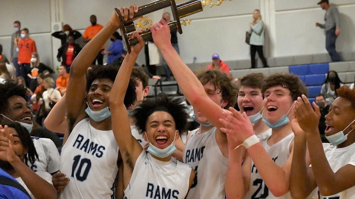 The Cleveland Rams celebrate with the Conference Championship trophy after their defeat of Fuquay-Varina. The Cleveland Rams and the Fuquay-Varina Bengals met in the Greater Neuse Conference Championships in Garner, N.C. on February 18, 2022.